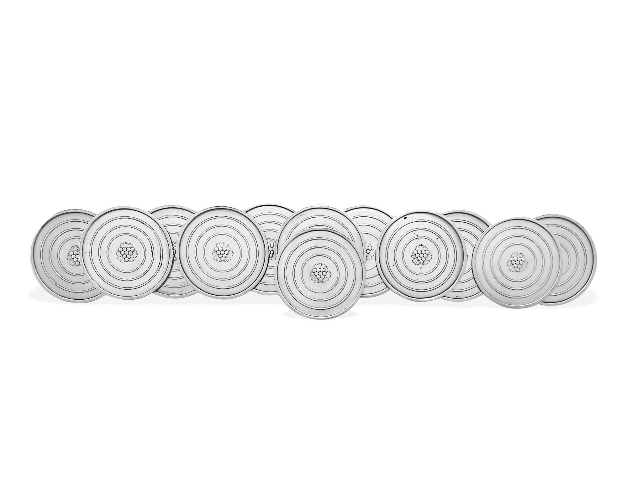 A Set of Twelve Georg Jensen Silver Coasters