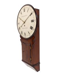 A Regency Figured Mahogany Wall Clock