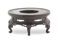 A Chinese Bronze Pedestal Stand YUAN/MING DYNASTY Height 3 1/2 x diameter 7 inches. — YUAN/MING DYNASTY