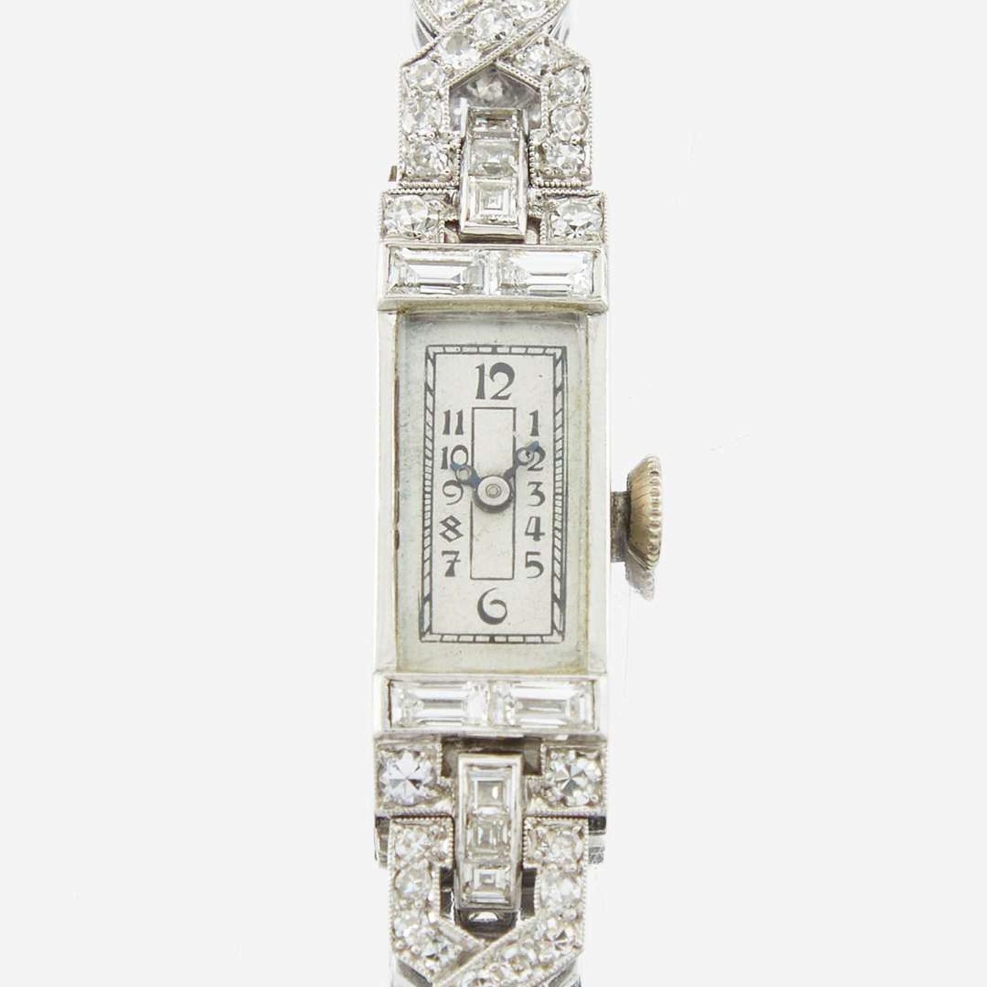 An Art Deco ladies platinum and diamond bracelet dress watch