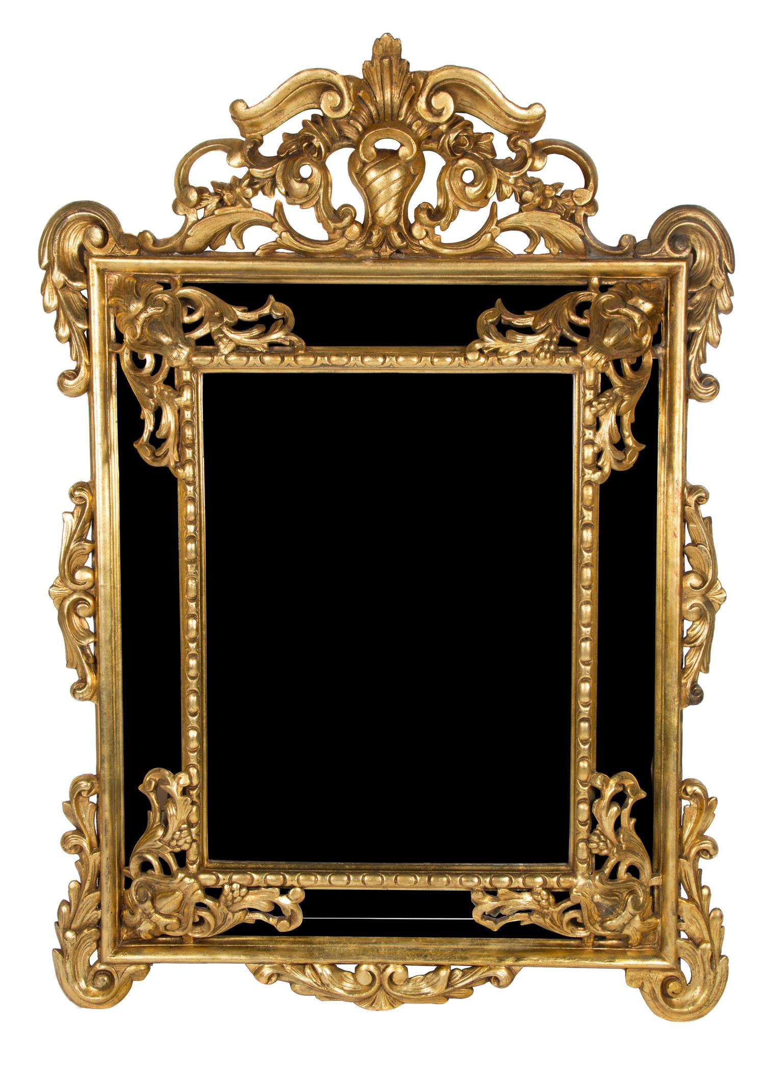 A Louis XIV Style Carved Giltwood Mirror 64 3/4 x 46 1/4 inches. — LATE 19TH CENTURY