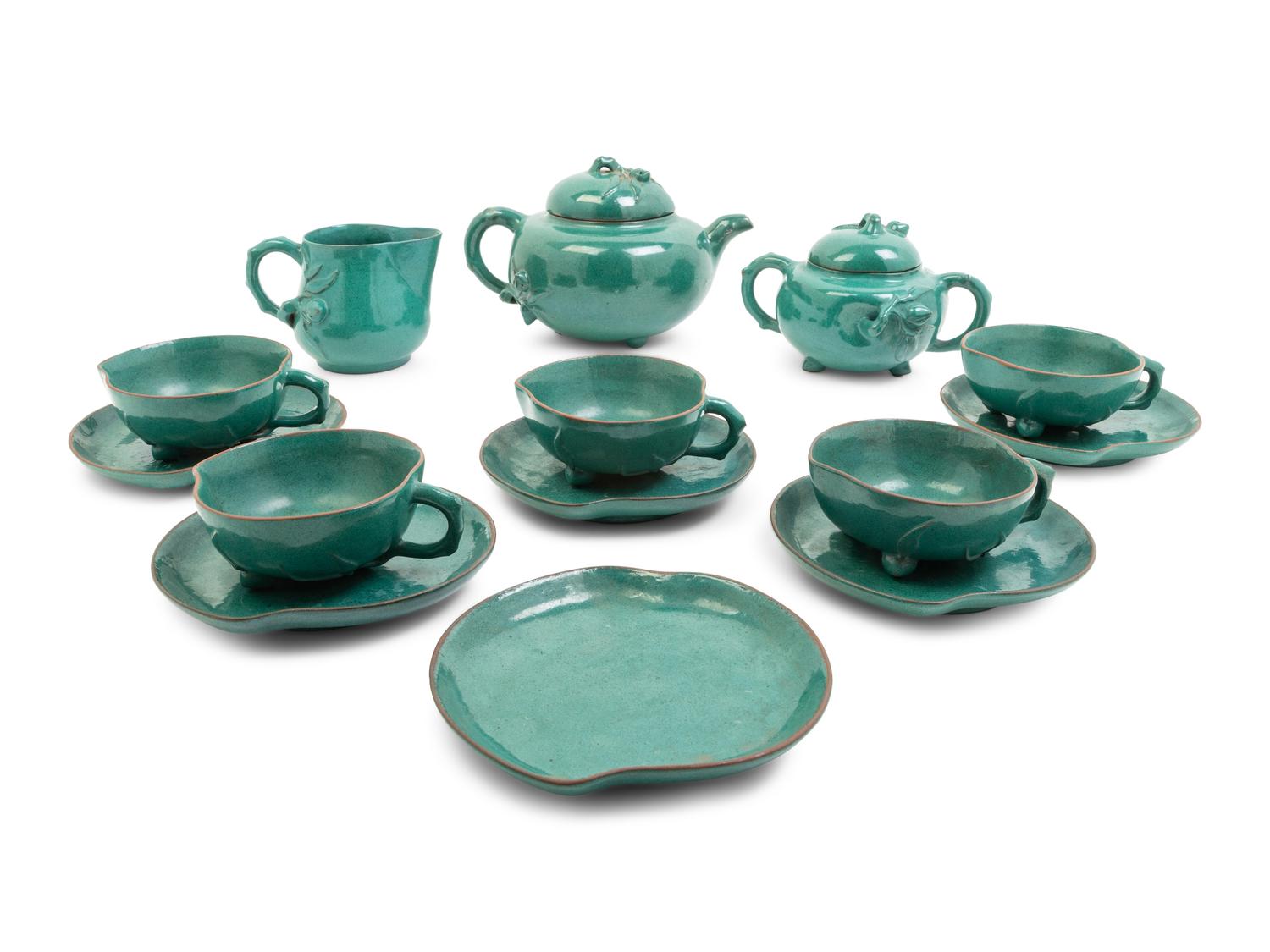A Chinese Green Glazed Zisha Pottery Tea Set