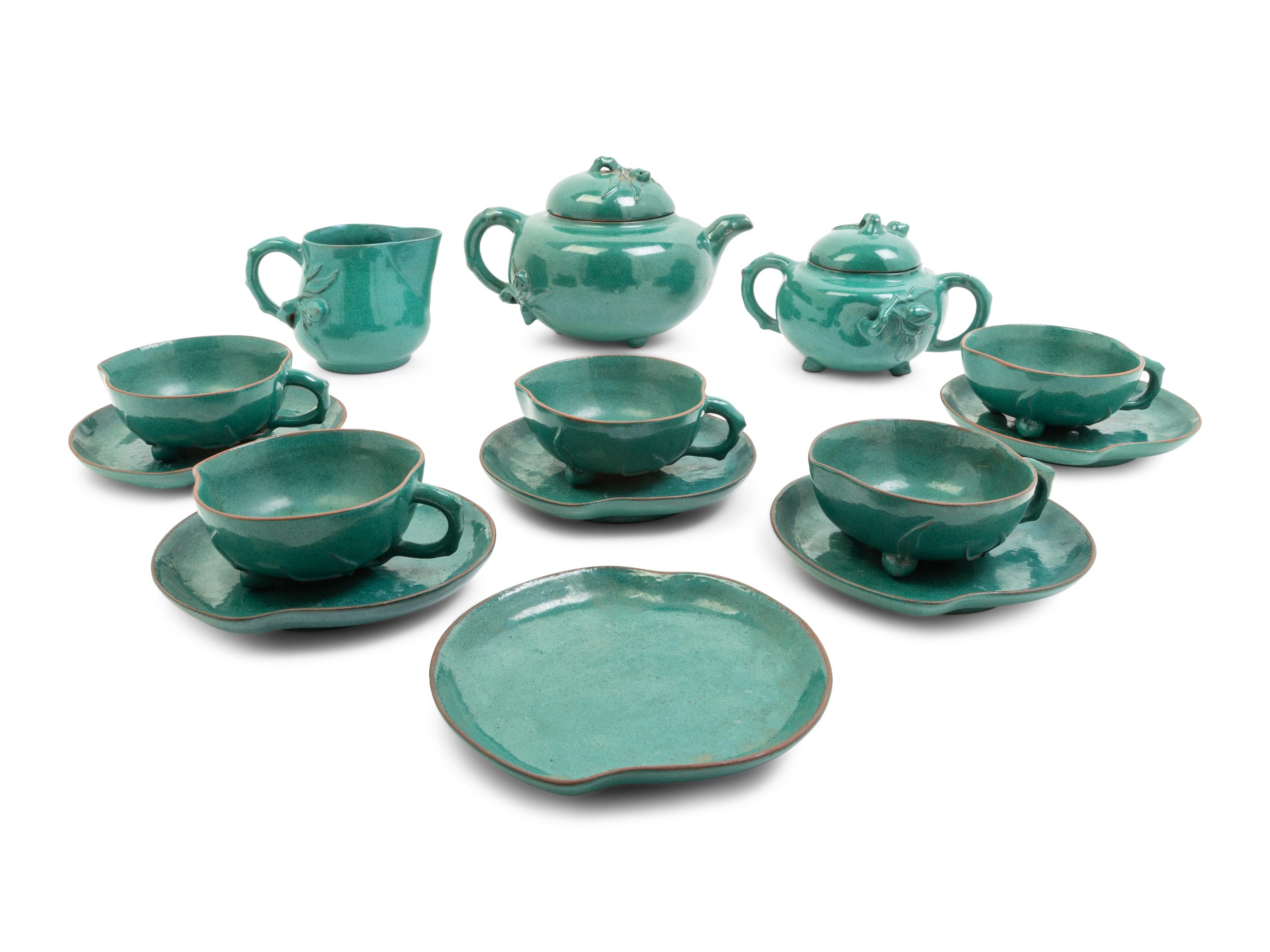 A Chinese Green Glazed Zisha Pottery Tea Set
