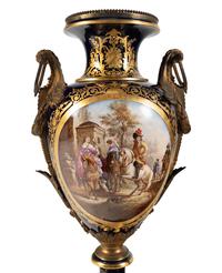 A Pair of Large Gilt Bronze Mounted Sèvres Style Porcelain Urns