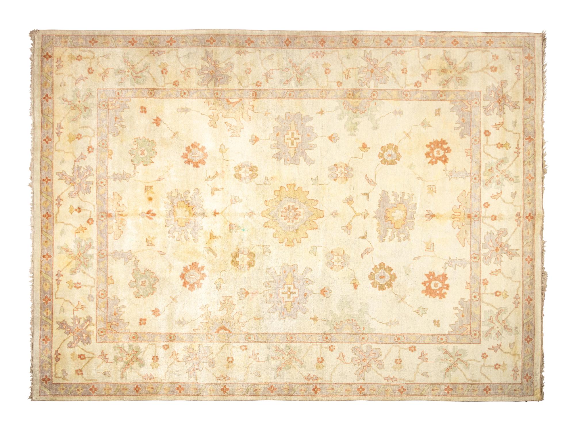 An Oushak Wool Rug