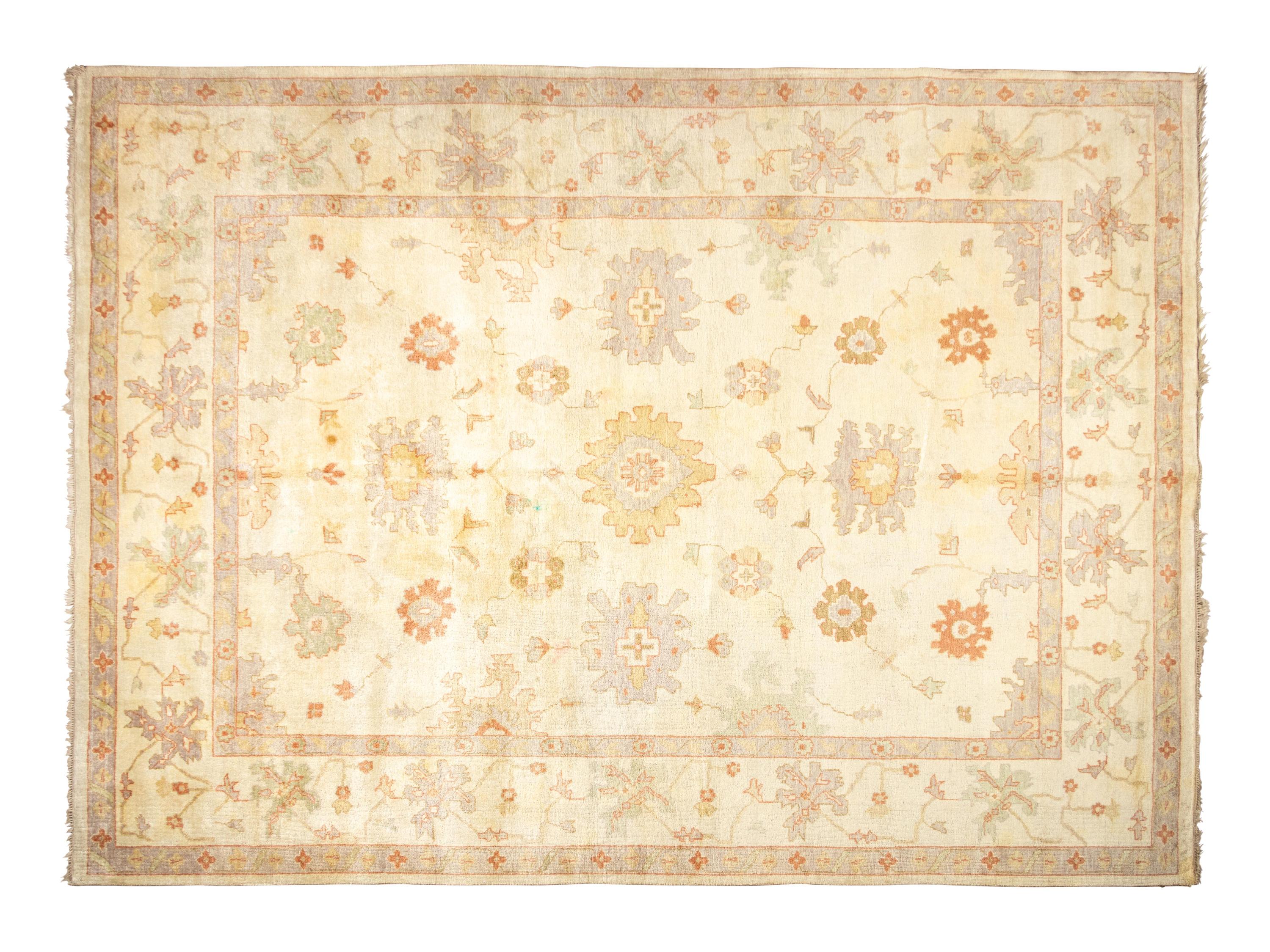 An Oushak Wool Rug