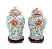 A Pair of Chinese Famille Rose Porcelain Covered Jars Height 17 1/4 inches. — LATE 19TH/EARLY 20TH CENTURY