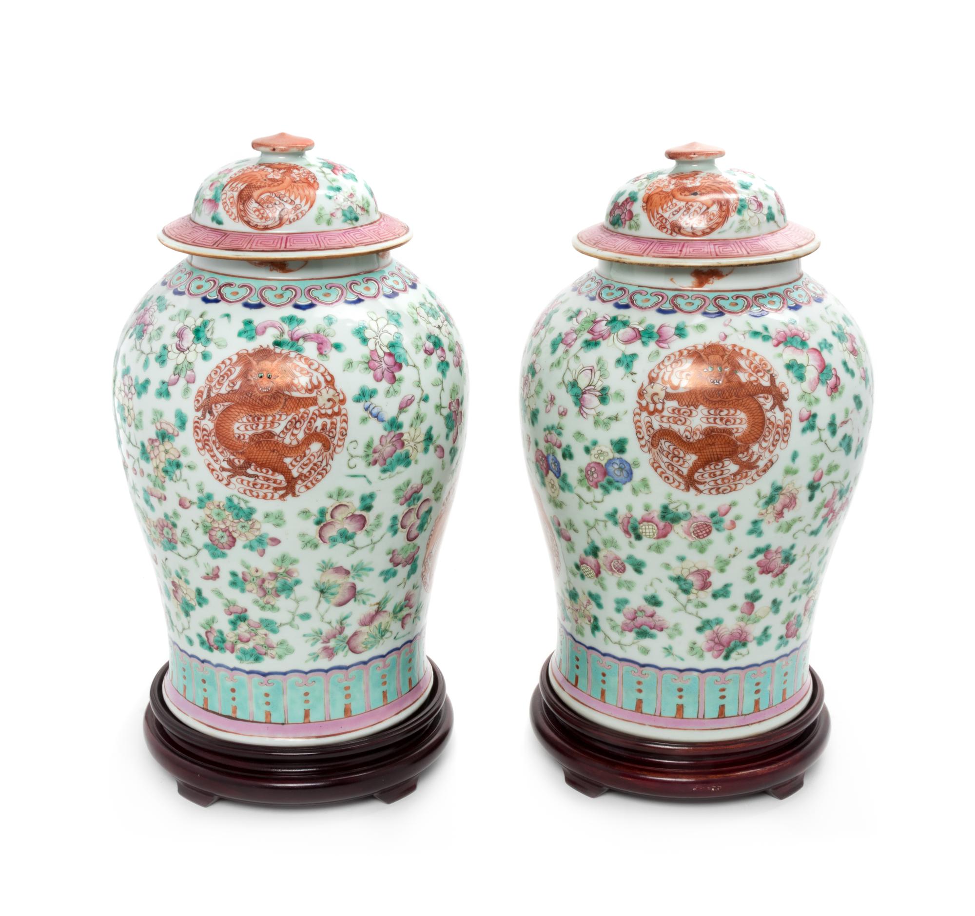 A Pair of Chinese Famille Rose Porcelain Covered Jars Height 17 1/4 inches. — LATE 19TH/EARLY 20TH CENTURY
