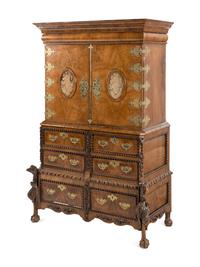 A Continental Baroque Brass Mounted Walnut Cabinet on Chest