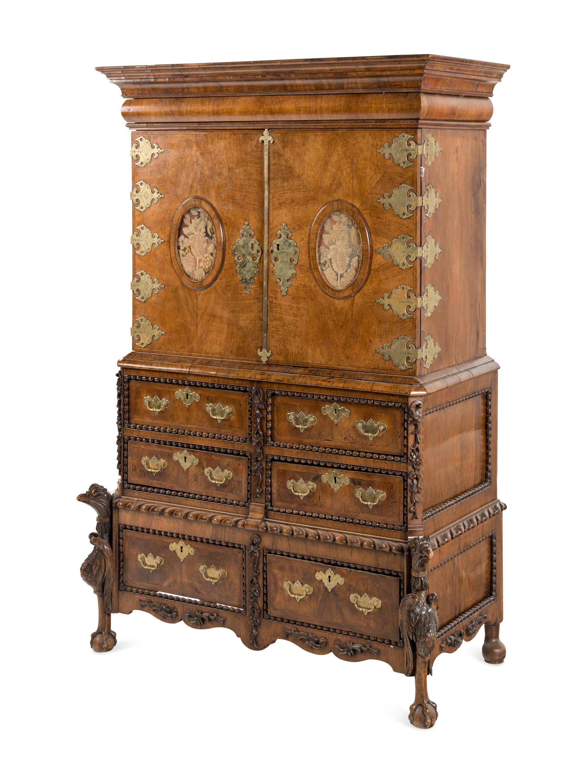 A Continental Baroque Brass Mounted Walnut Cabinet on Chest