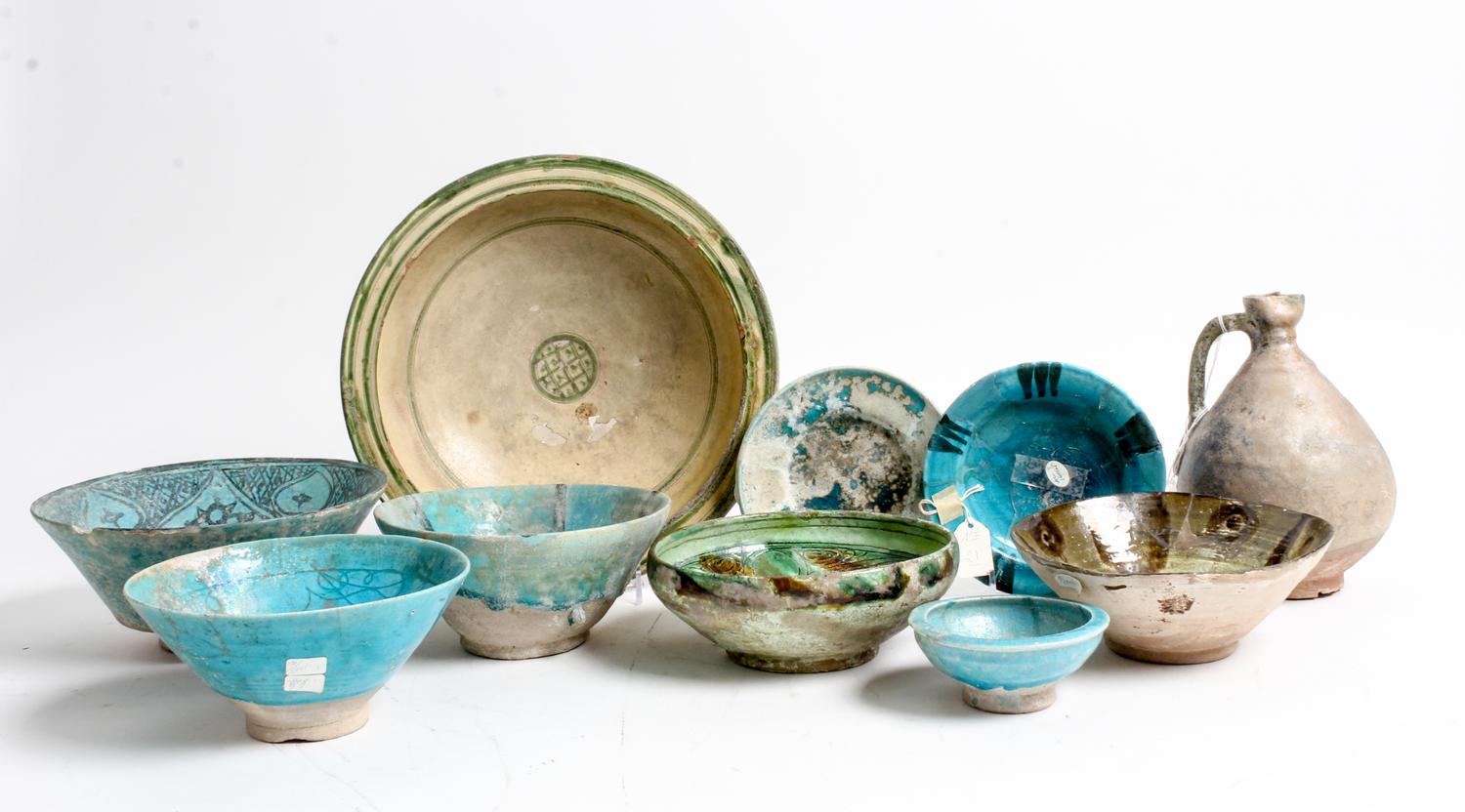 A Group of Nine Middle Eastern Ceramic Bowls Diameter of largest 11 inches.