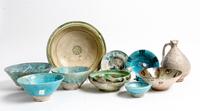 A Group of Nine Middle Eastern Ceramic Bowls Diameter of largest 11 inches.