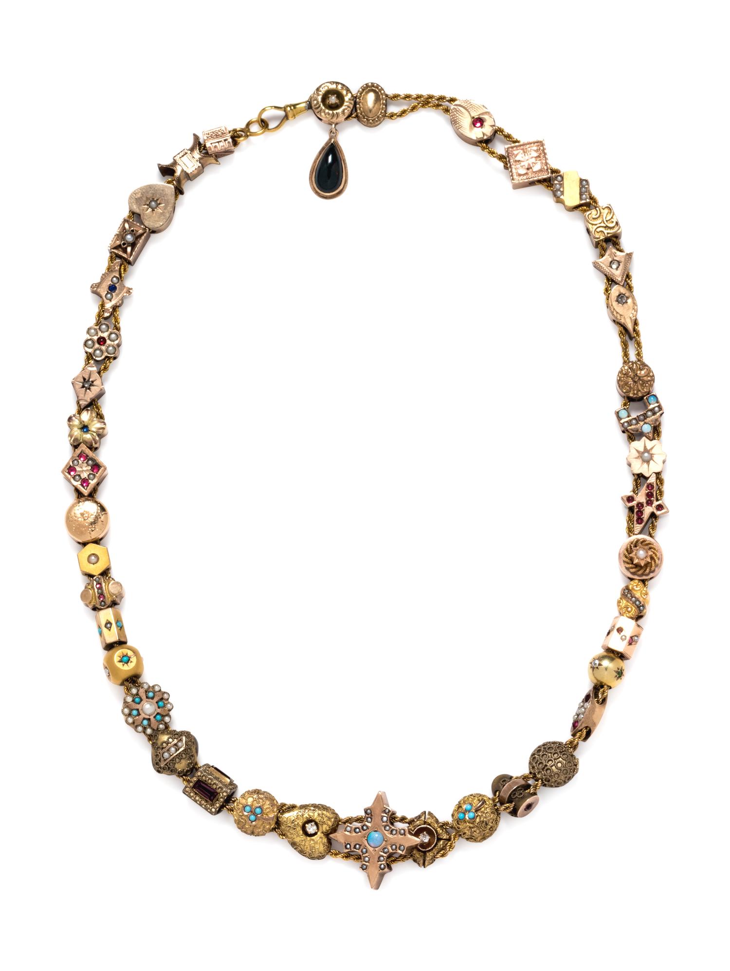 A Gold, Mixed Metal, Gemstone, and Synthetic Gemstone Charm Necklace,