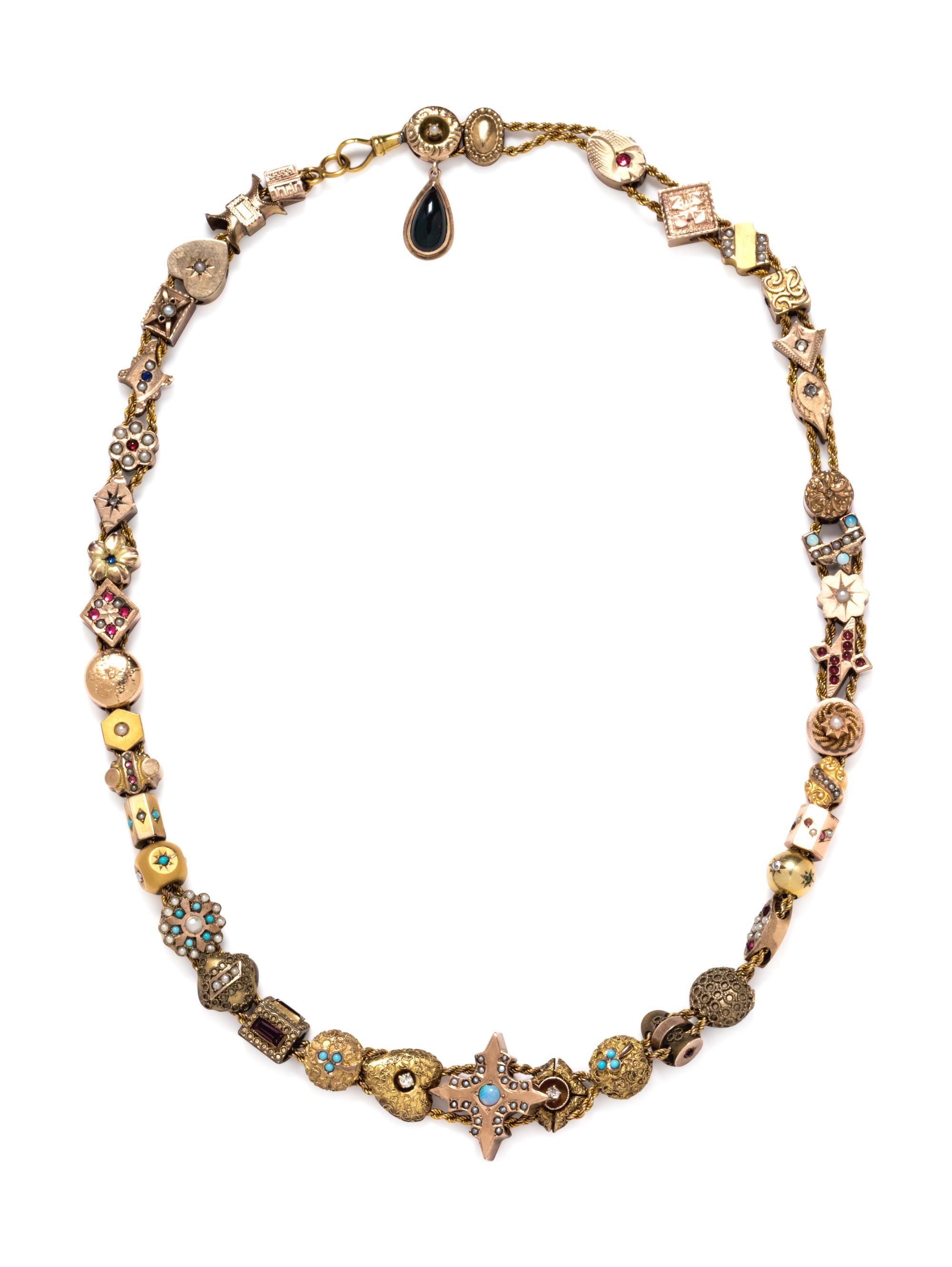 A Gold, Mixed Metal, Gemstone, and Synthetic Gemstone Charm Necklace,
