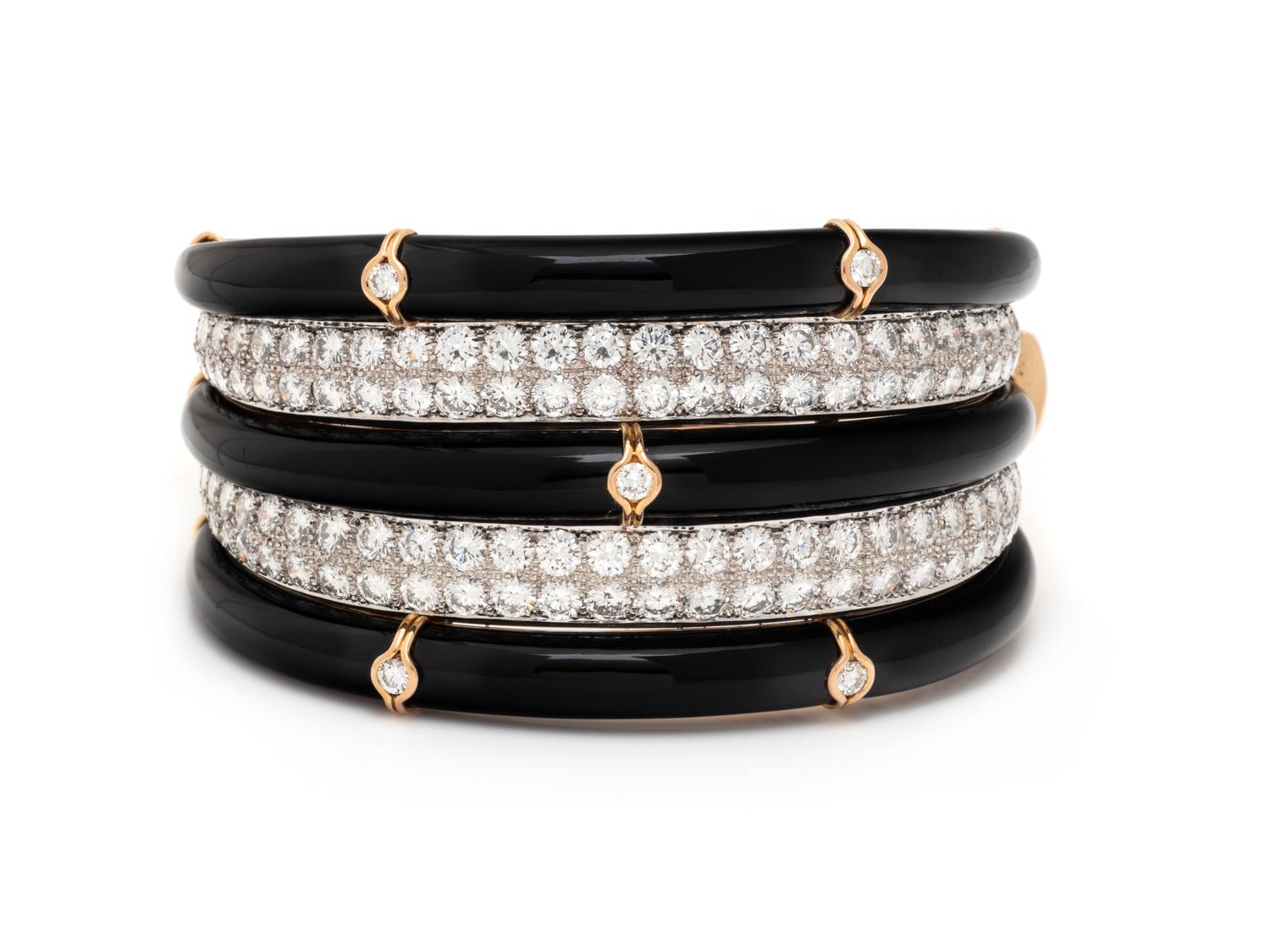 DIAMOND, BLACK ONYX, AND BICOLOR GOLD BANGLE BRACELET