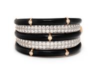 DIAMOND, BLACK ONYX, AND BICOLOR GOLD BANGLE BRACELET
