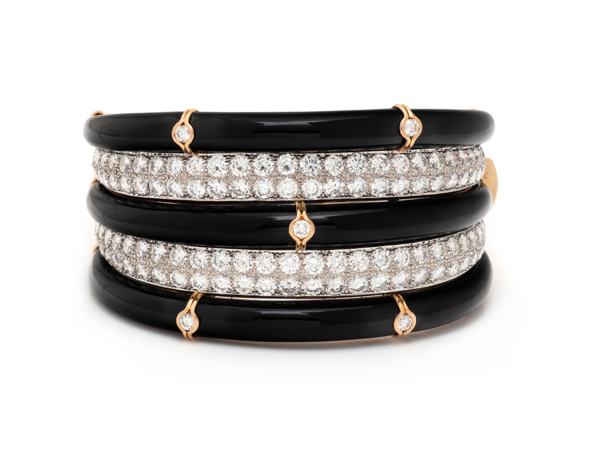 DIAMOND, BLACK ONYX, AND BICOLOR GOLD BANGLE BRACELET