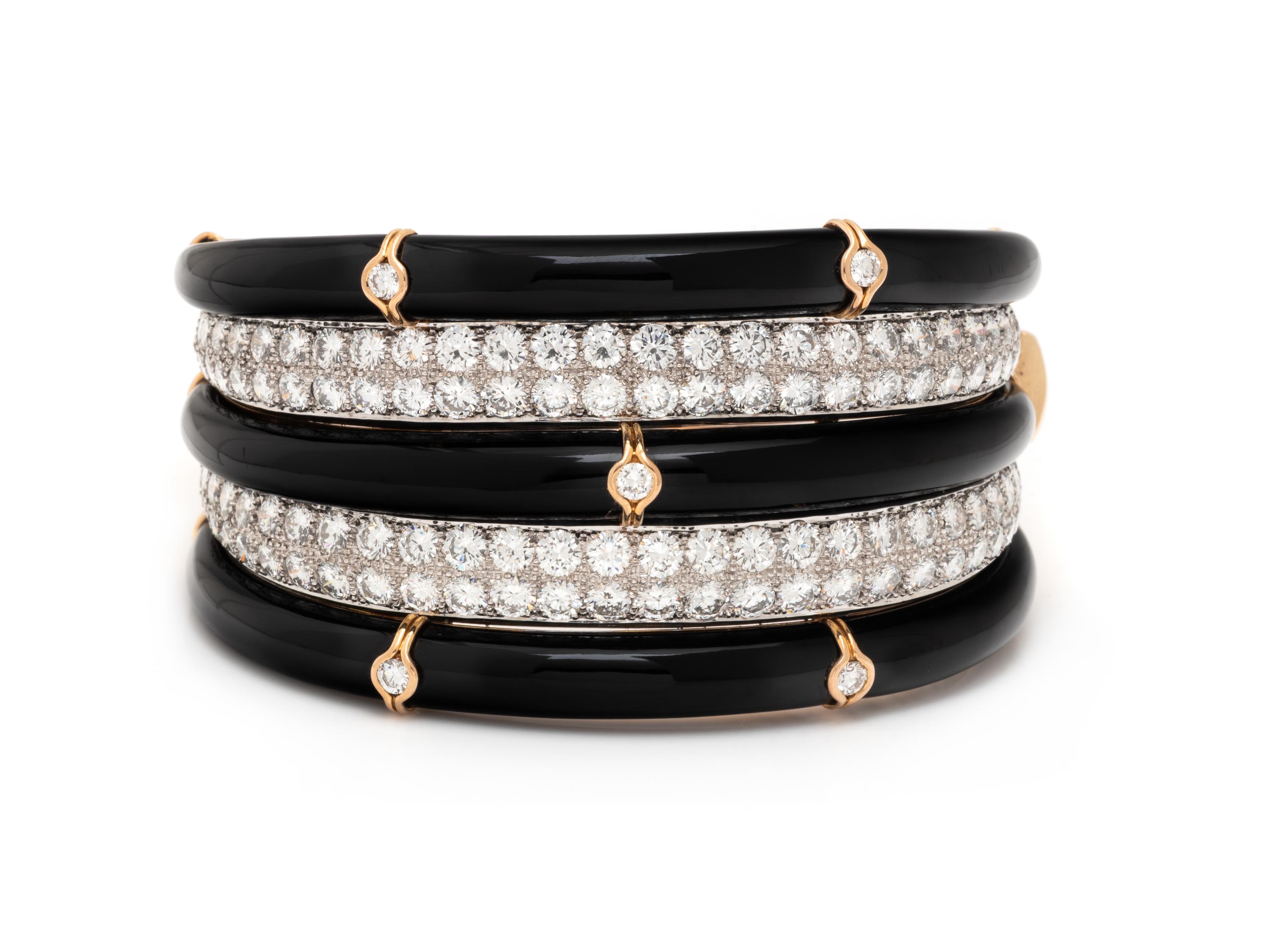DIAMOND, BLACK ONYX, AND BICOLOR GOLD BANGLE BRACELET