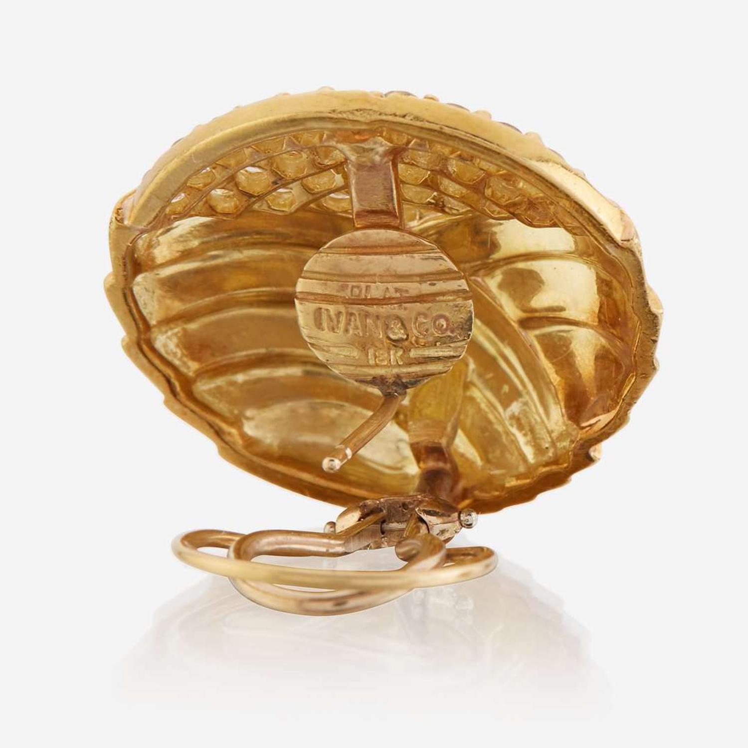 A pair of eighteen karat gold and diamond earrings, Ivan & Co.
