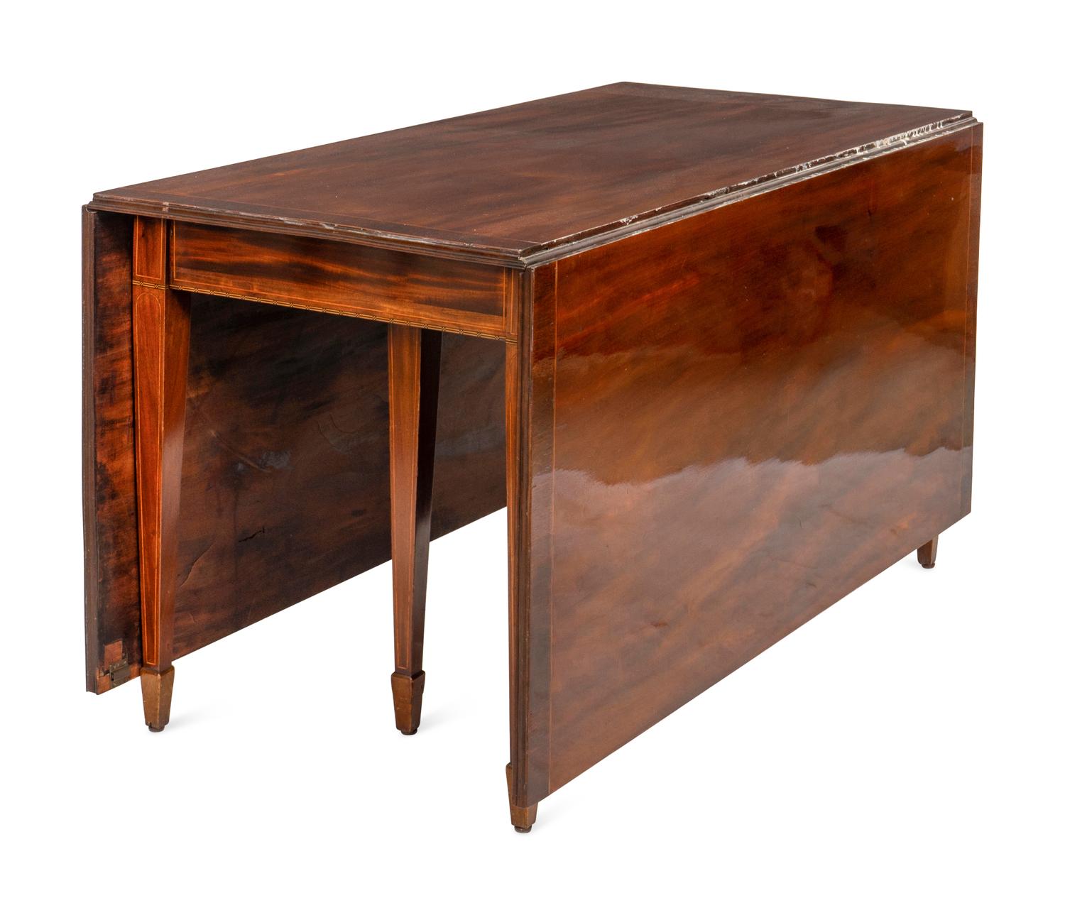 A Large George III Inlaid Mahogany Extendable Dining Table