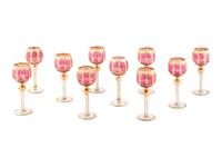 A Set of Ten Bohemian Gilt Decorated Red Cut to Clear Wine Stems