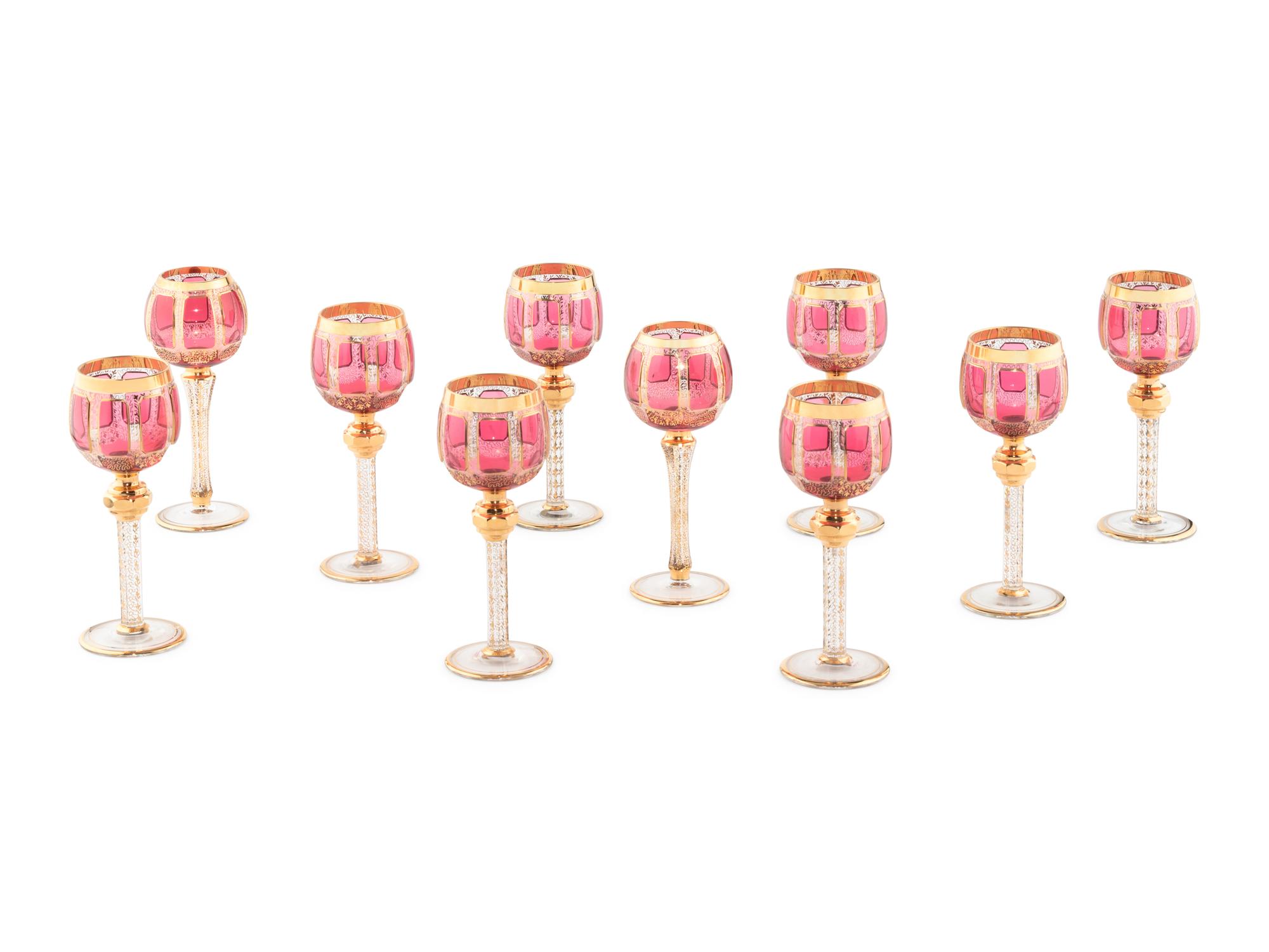 A Set of Ten Bohemian Gilt Decorated Red Cut to Clear Wine Stems
