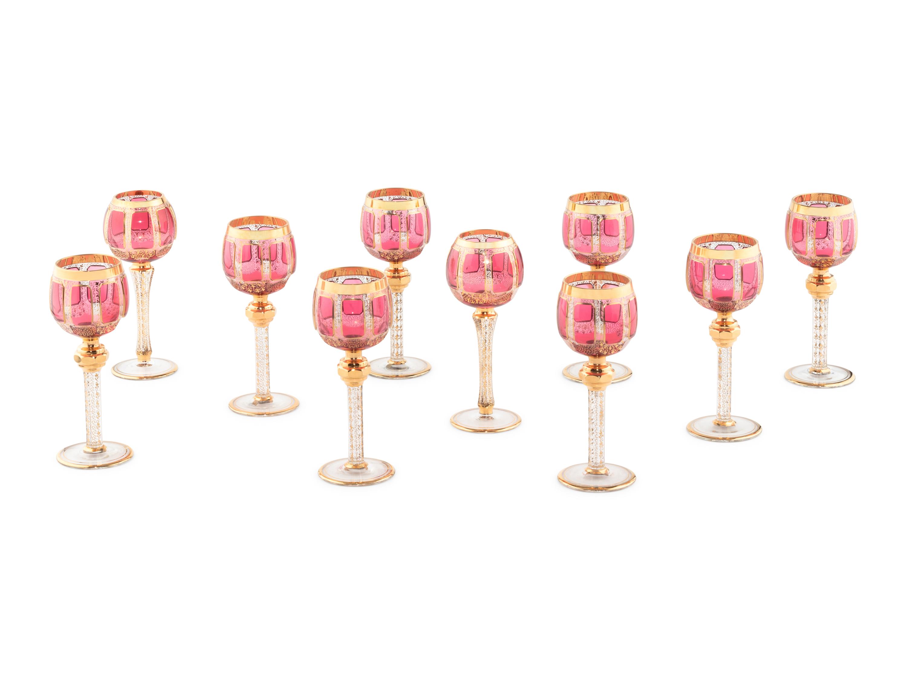 A Set of Ten Bohemian Gilt Decorated Red Cut to Clear Wine Stems