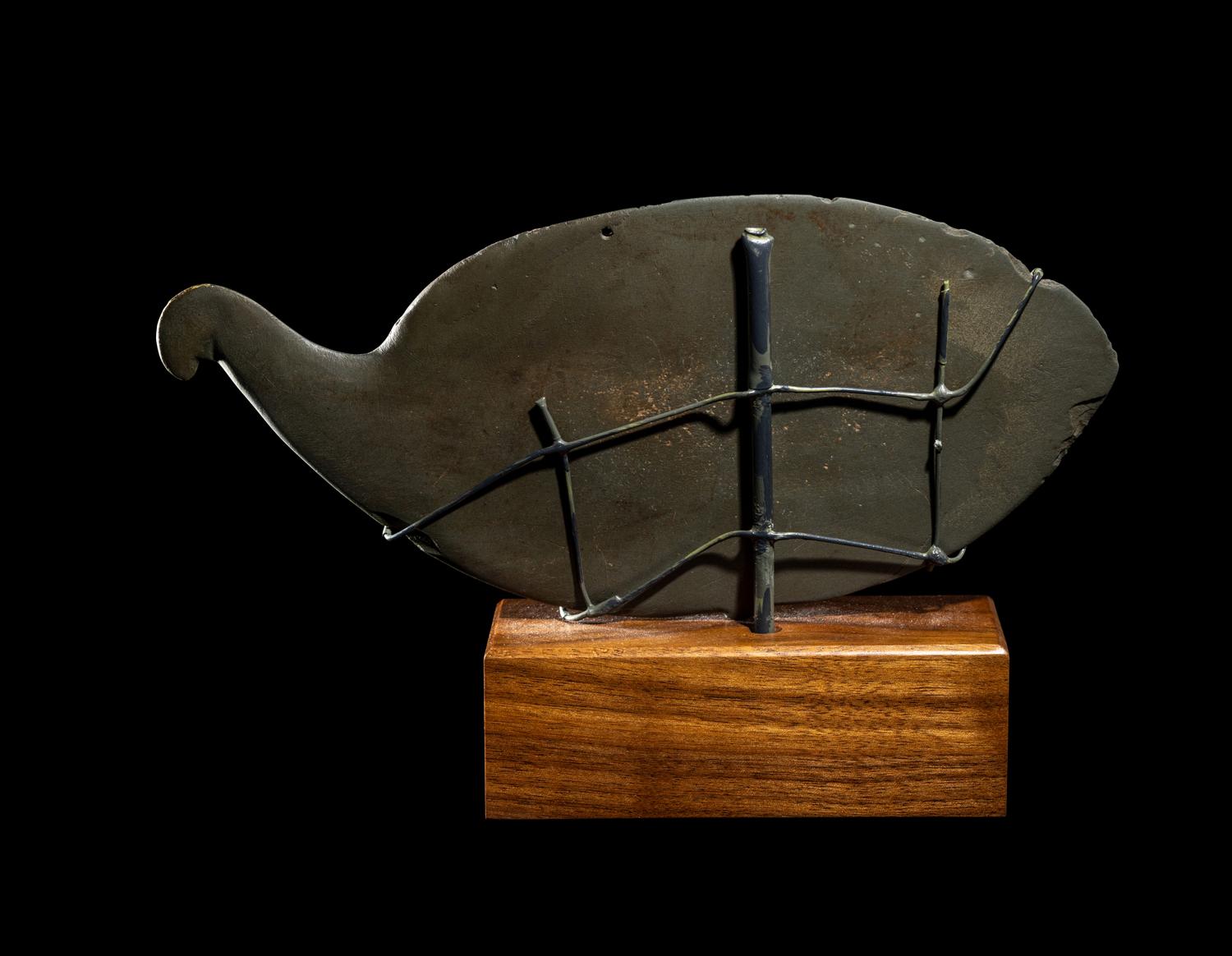 An Egyptian Greywacke Cosmetic Palette in the Form of a Bird