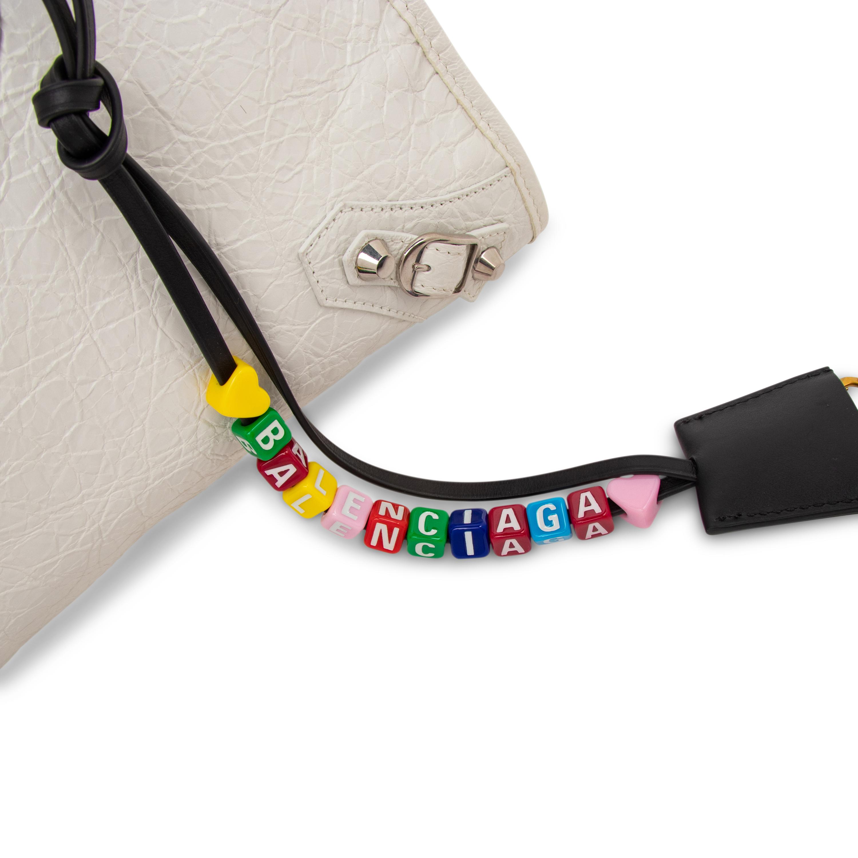 BALENCIAGA, WHITE MEDIUM CITY BAG WITH CHARMS