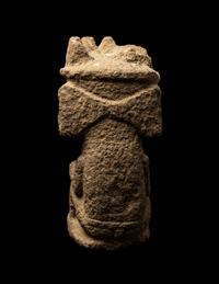 A Tlaloc Stone Figure