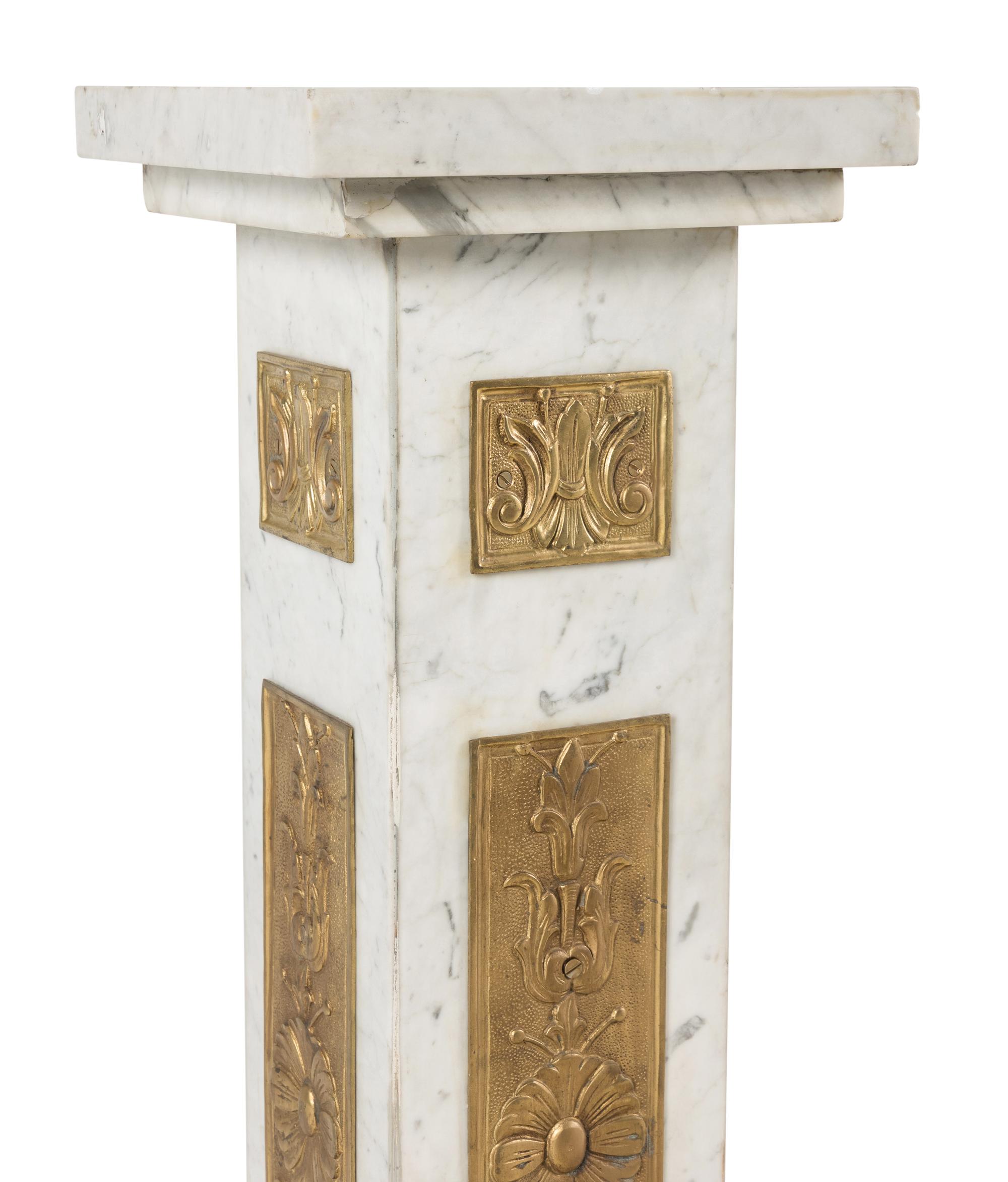 A Pair of Marble and Gilt Bronze Mounted Pedestals