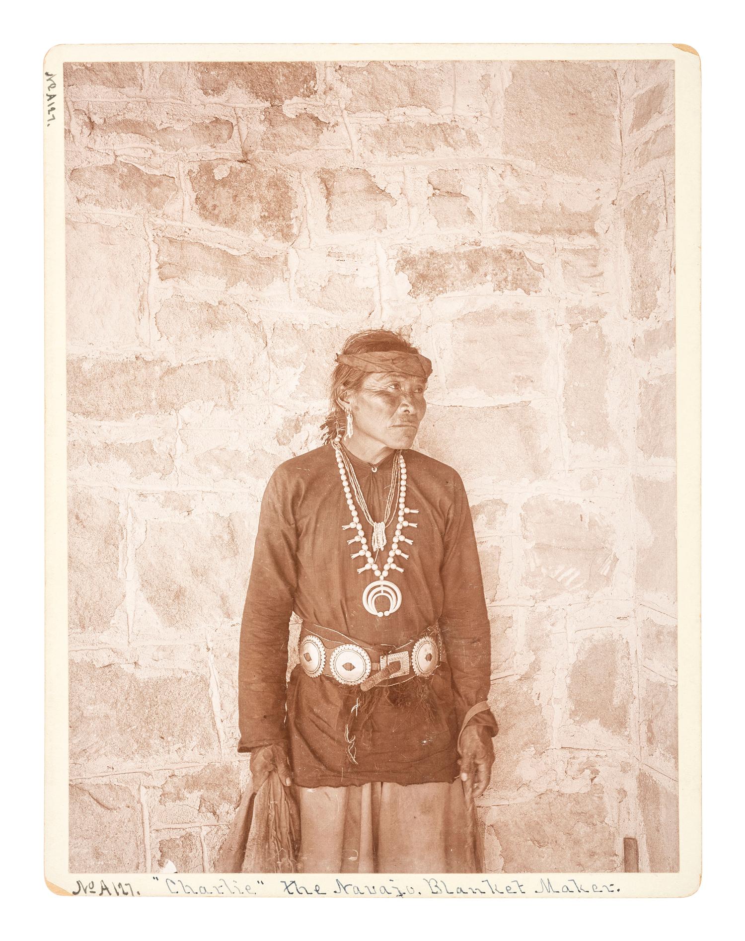 Native Americans [VROMAN, Adam C. (1856-1916), photographer]. "Charlie" the Navajo Blanket Maker. Ca 1895.
