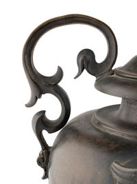A Continental Bronze Water Urn