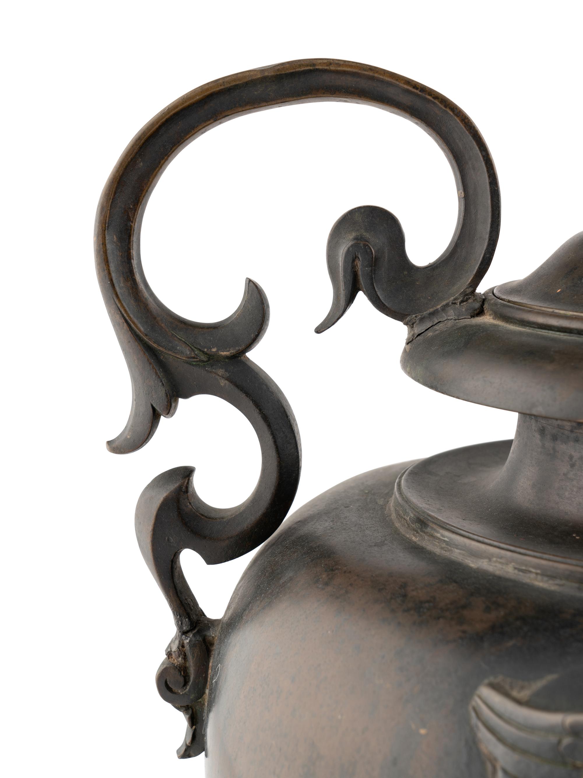 A Continental Bronze Water Urn