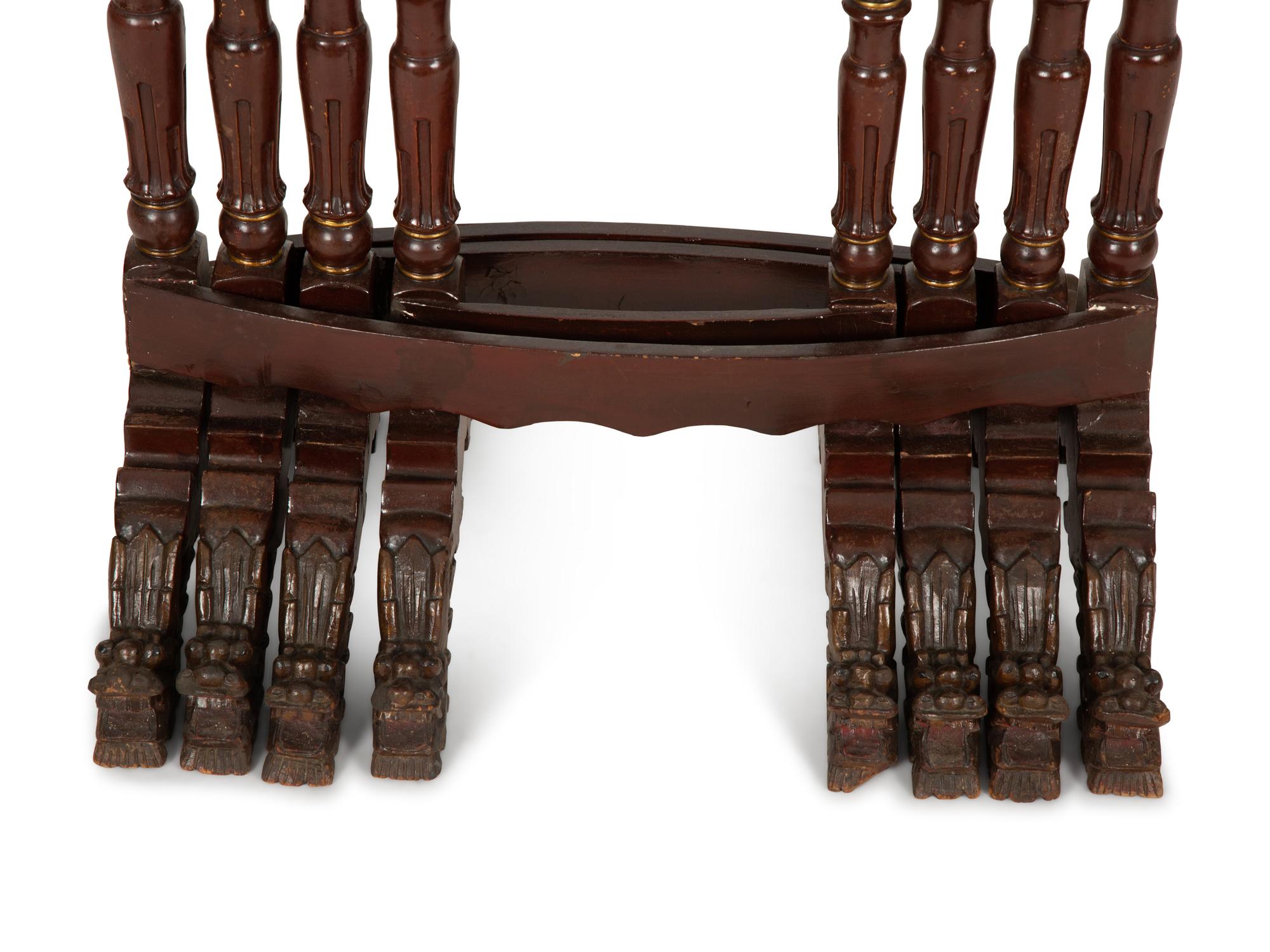 A Set of Four Chinese Lacquered Nesting Tables