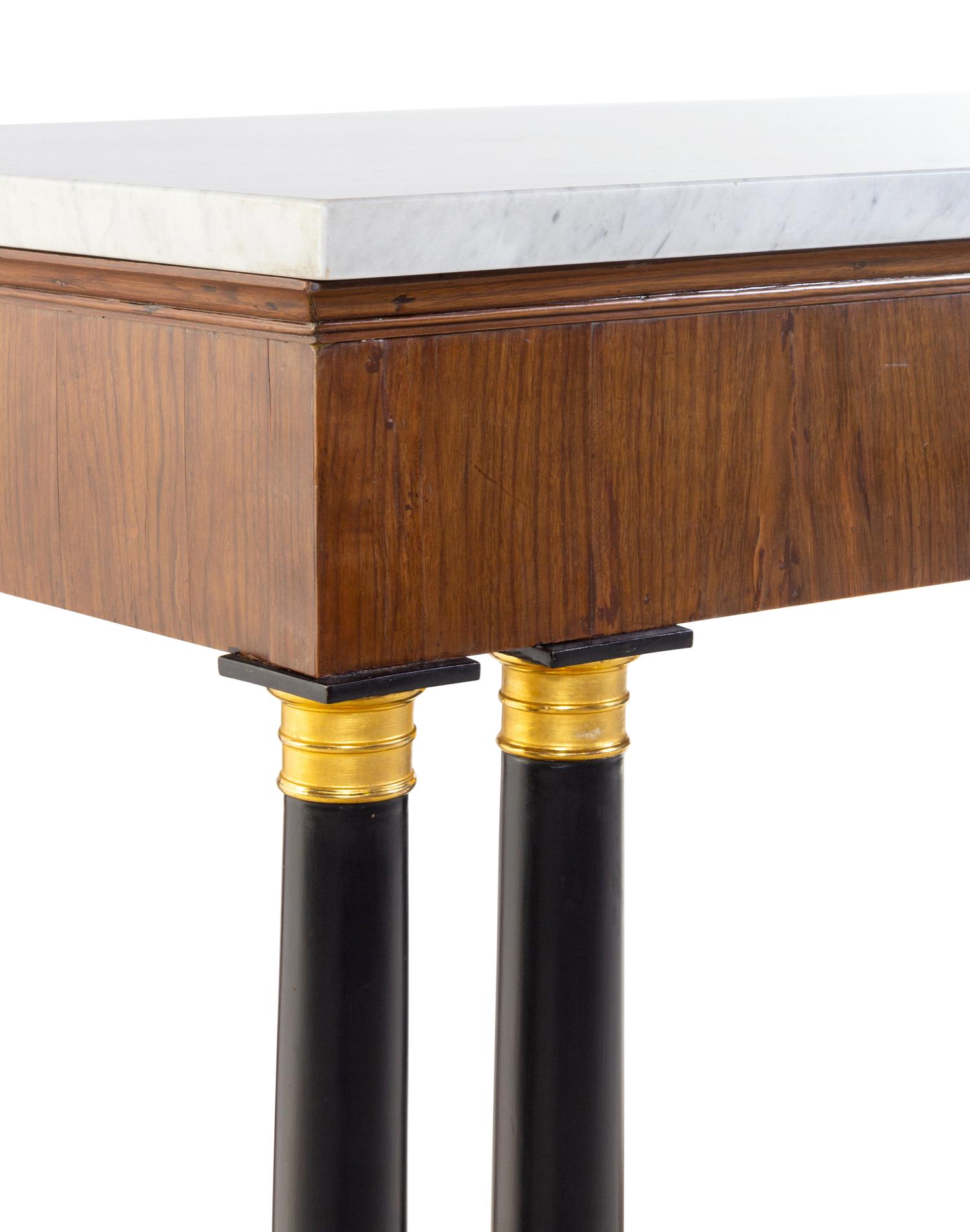 A Pair of Russian Empire Gilt Metal Mounted Parcel Ebonized Mahogany Marble-Top Console Tables