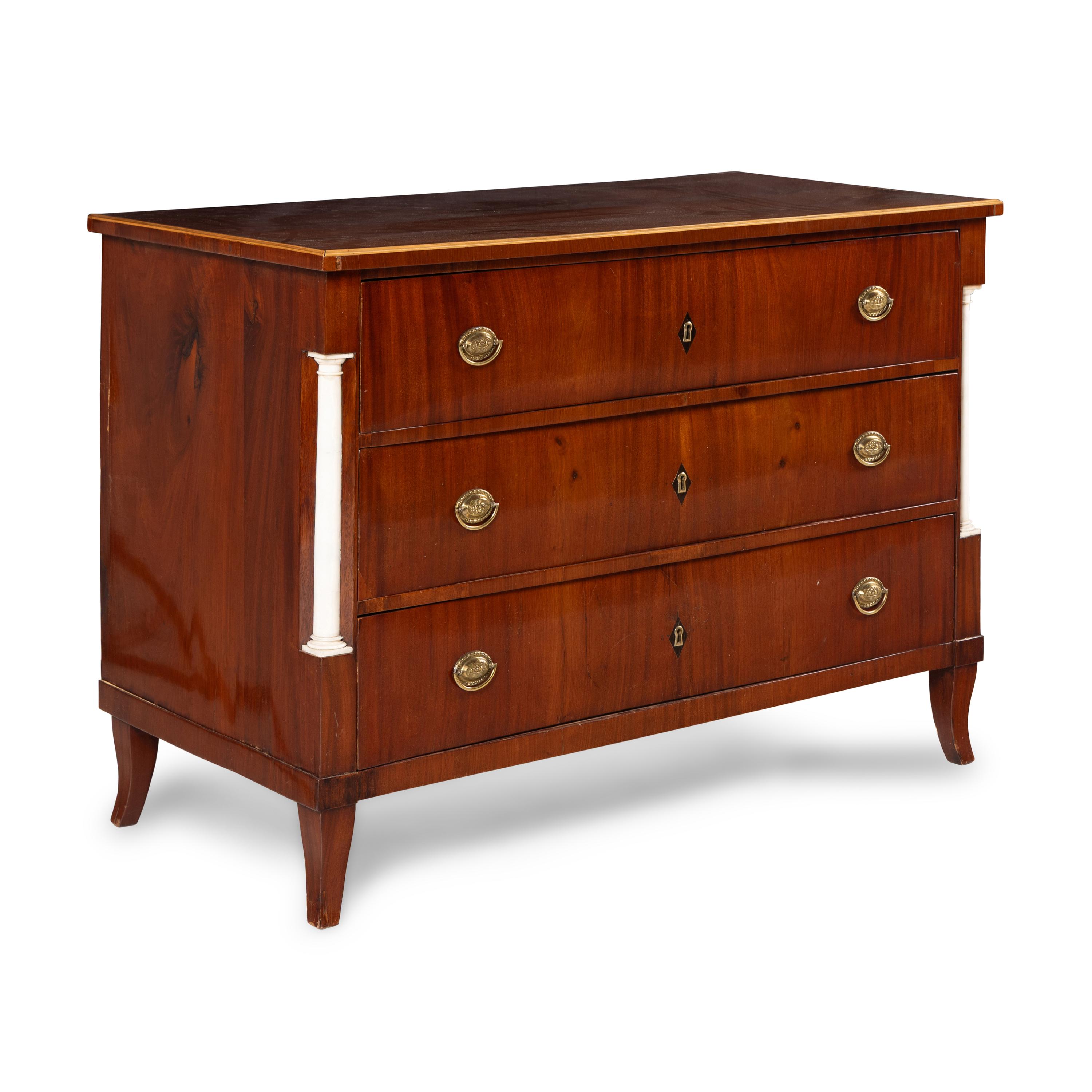A German Neoclassical Figured Walnut and White Marble Mounted Commode