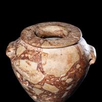 An Egyptian Breccia Jar