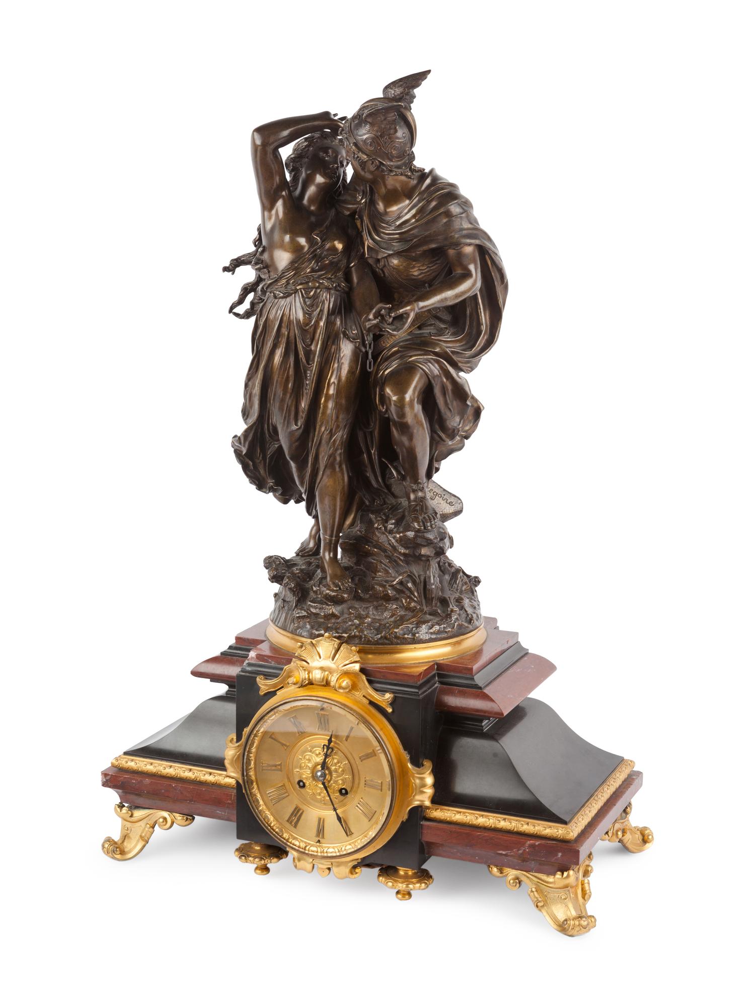 A French Gilt and Patinated Bronze and Marble Mantel Clock