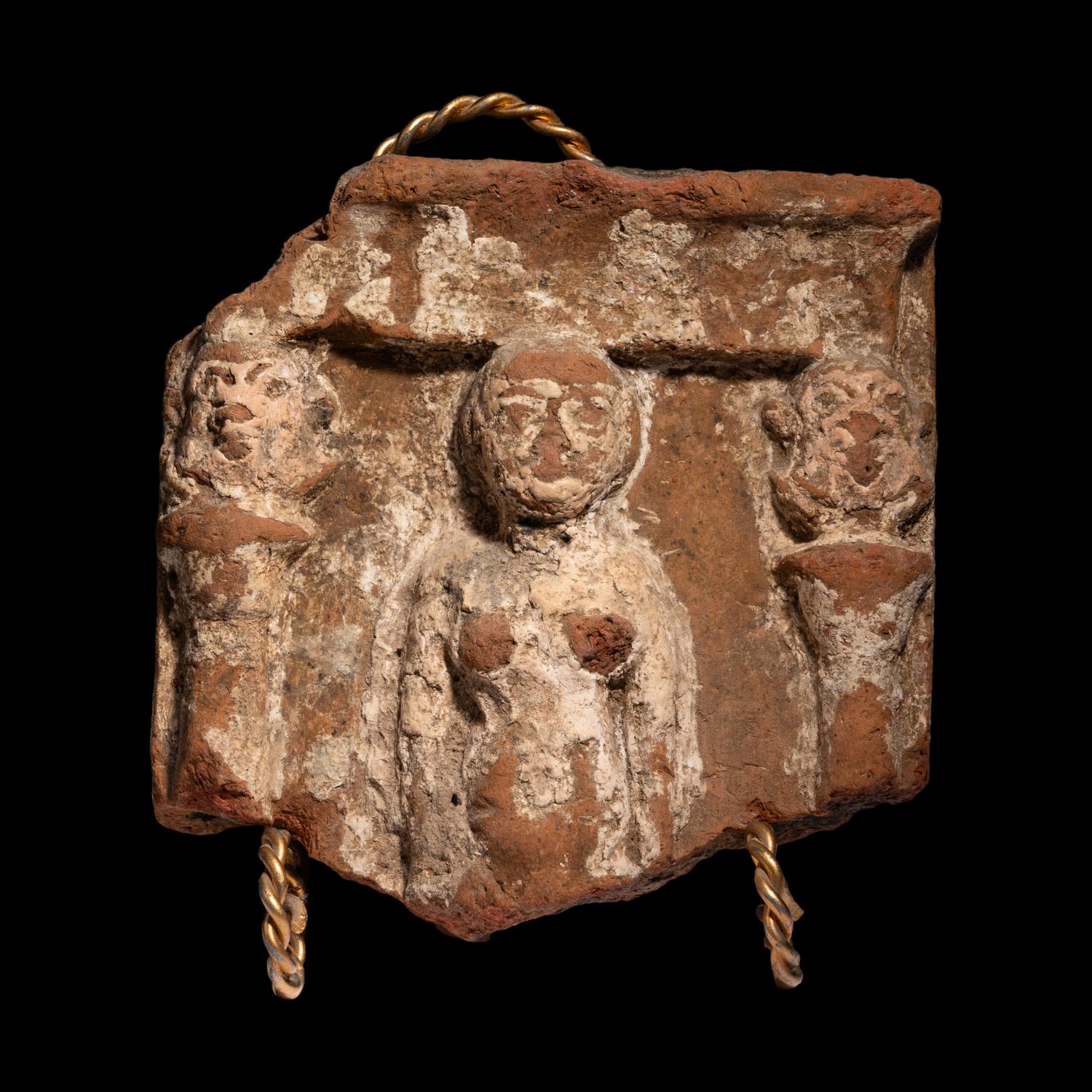 An Egyptian Terracotta Fragment with Concubine Flanked by Bes-Shaped Columns