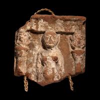 An Egyptian Terracotta Fragment with Concubine Flanked by Bes-Shaped Columns