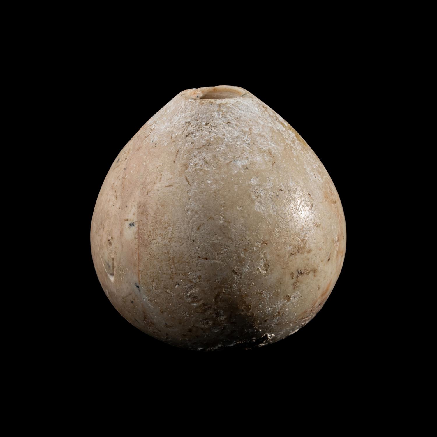 An Egyptian Limestone Mace Head