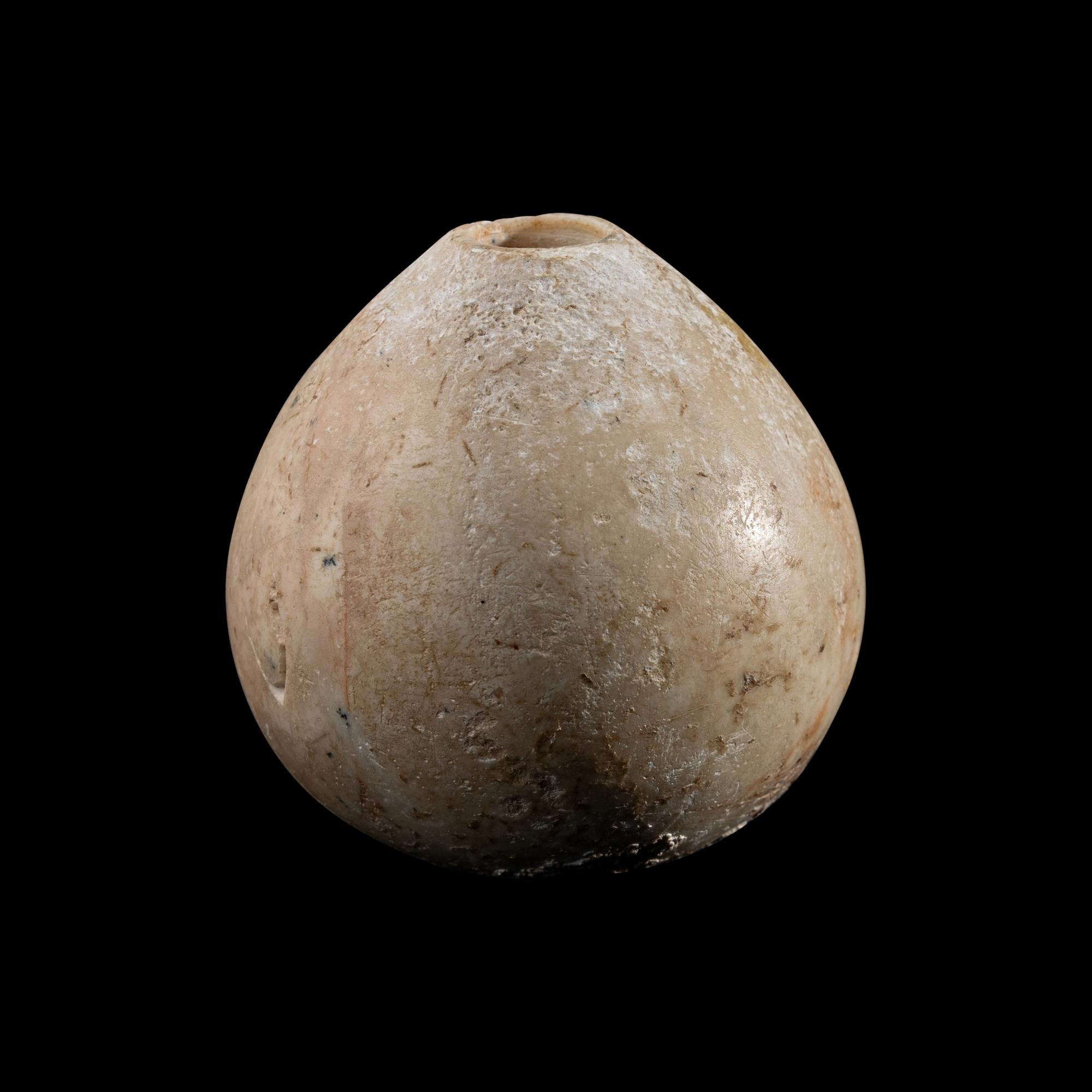 An Egyptian Limestone Mace Head