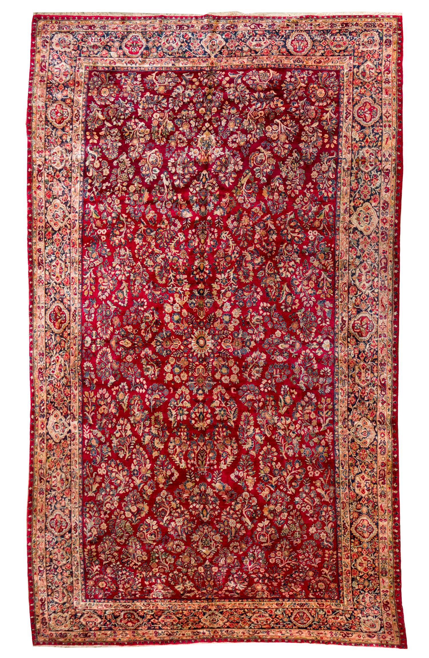 A Sarouk Wool Rug, 18 feet 11 inches x 11 feet 2 inches.