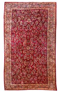 A Sarouk Wool Rug, 18 feet 11 inches x 11 feet 2 inches.
