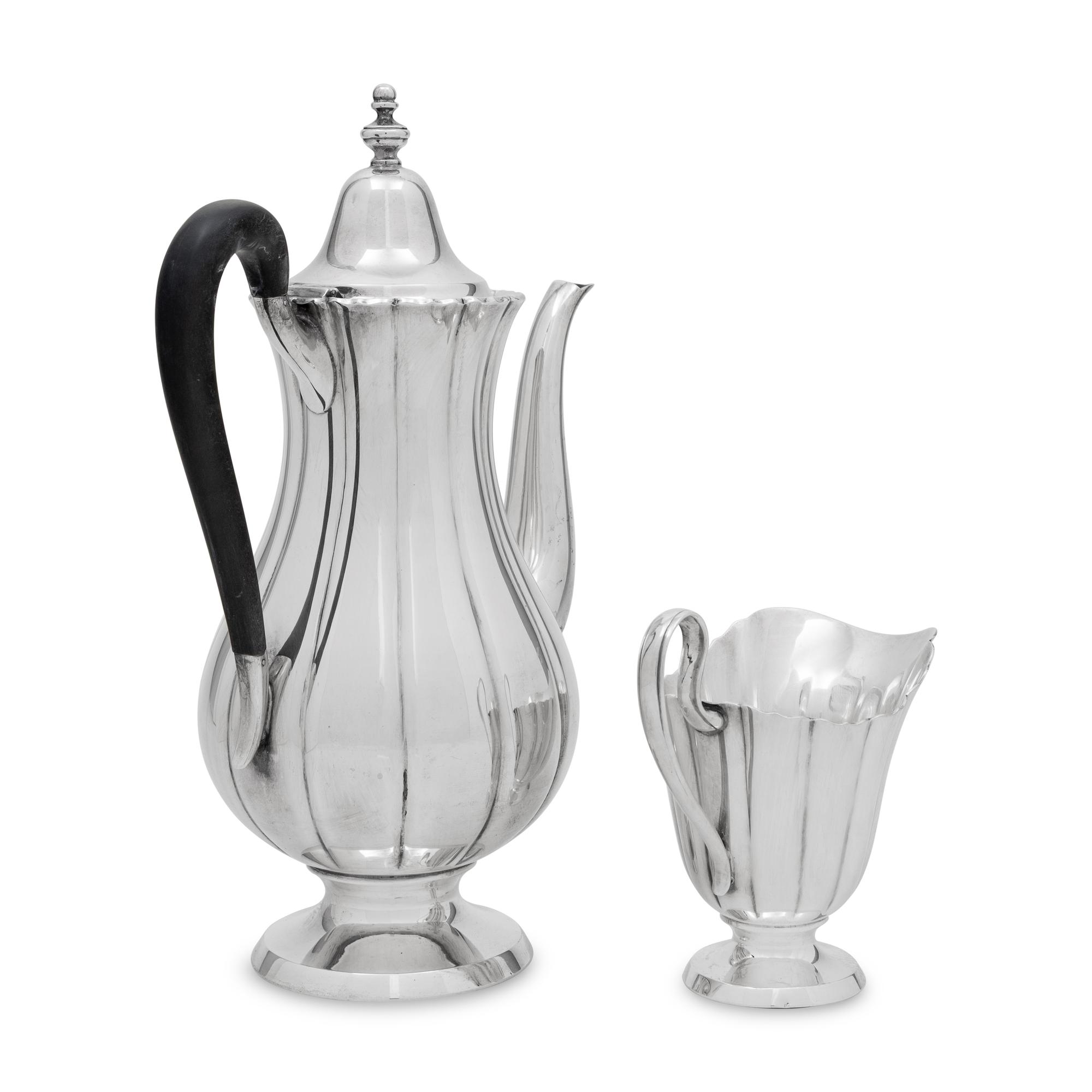 An American Silver Coffee Pot and Creamer