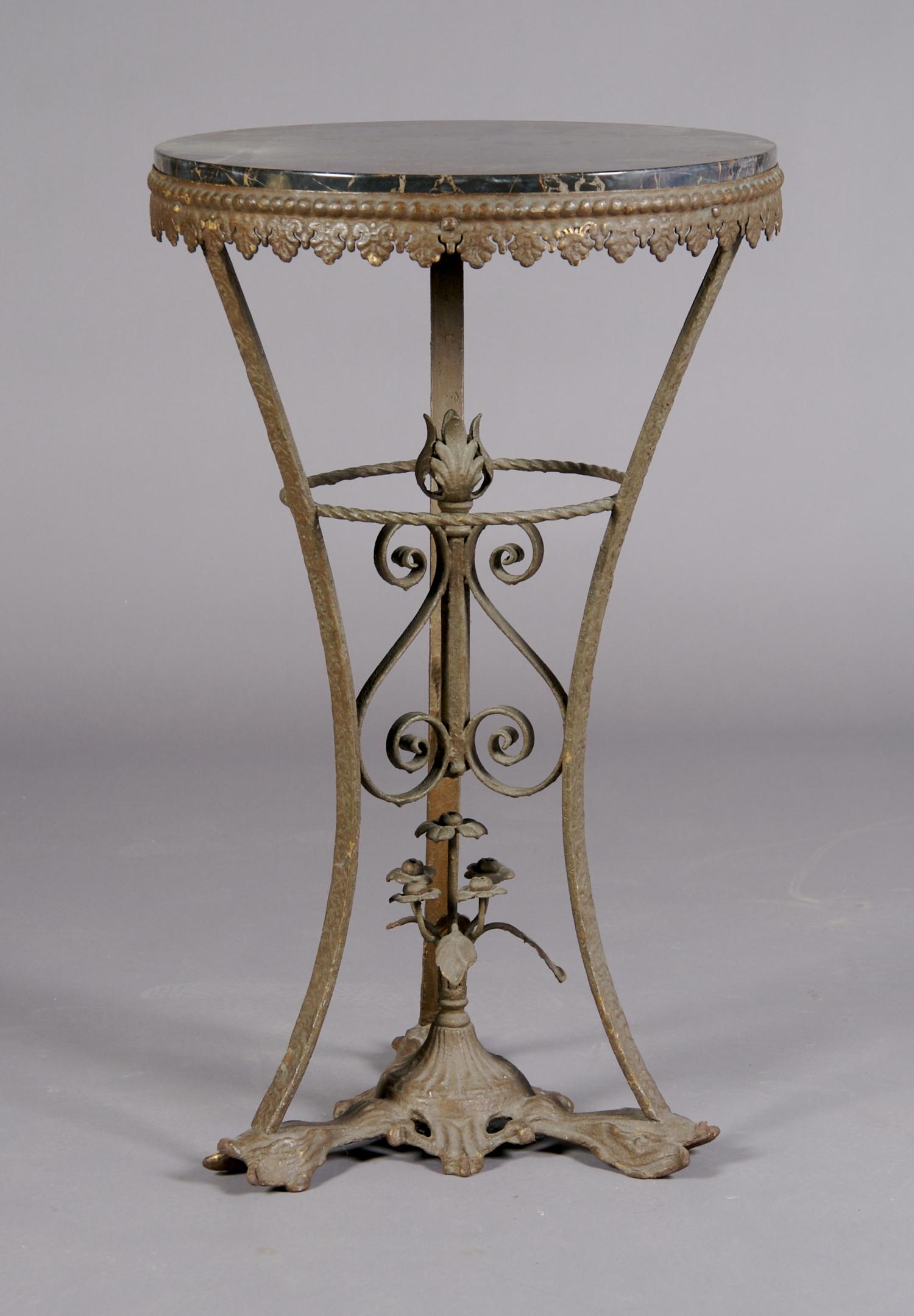 A Renaissance Revival Style Side Table, Height 30 1/4 x diameter 18 1/2 inches.