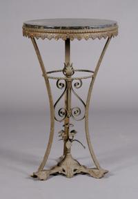 A Renaissance Revival Style Side Table, Height 30 1/4 x diameter 18 1/2 inches.