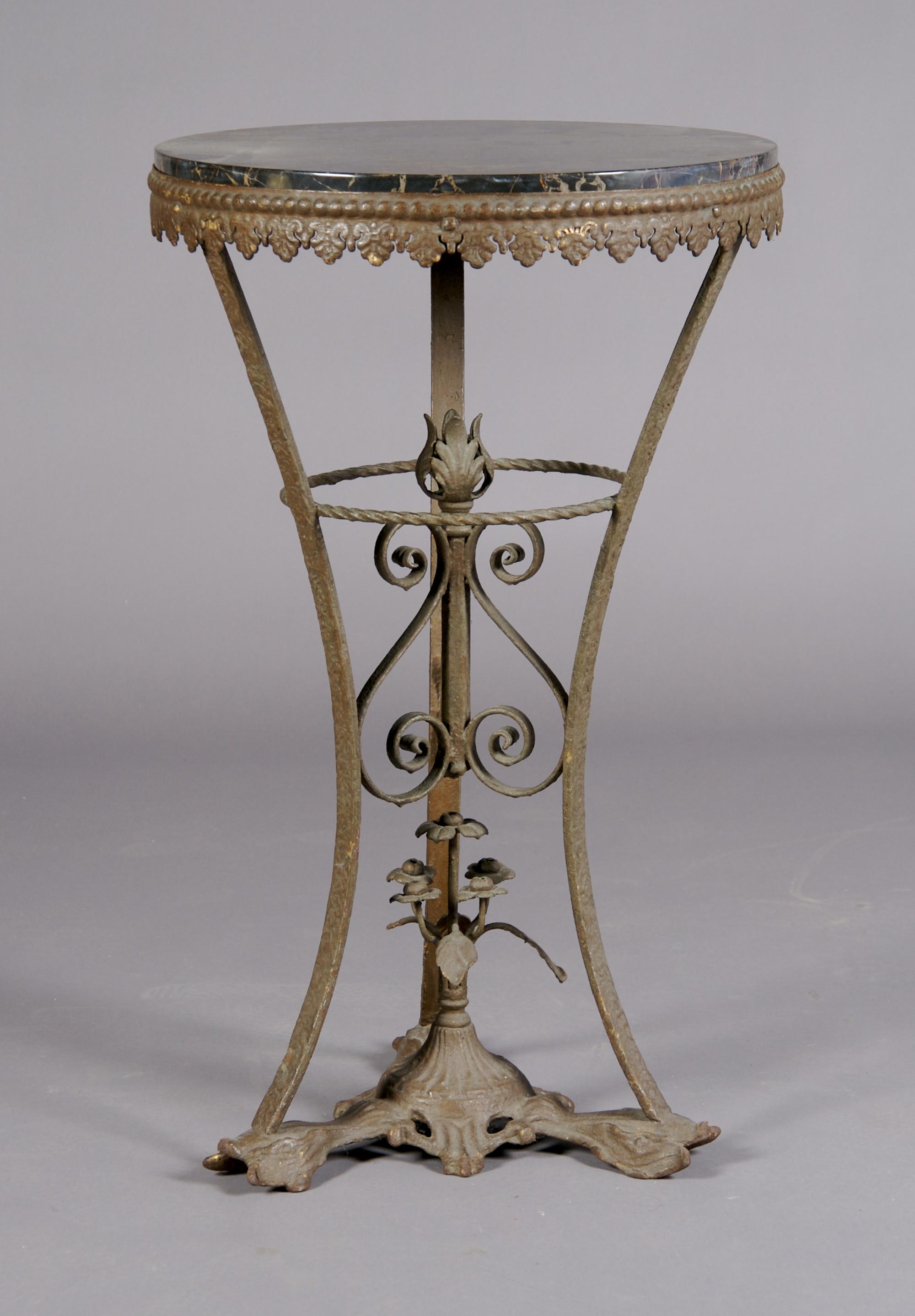 A Renaissance Revival Style Side Table, Height 30 1/4 x diameter 18 1/2 inches.