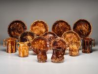 Fifteen Rockingham Pitchers and Plates